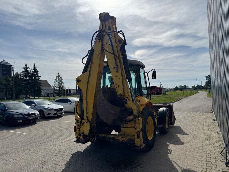 Backhoe loader New Holland B 110-4PT- Photo 3