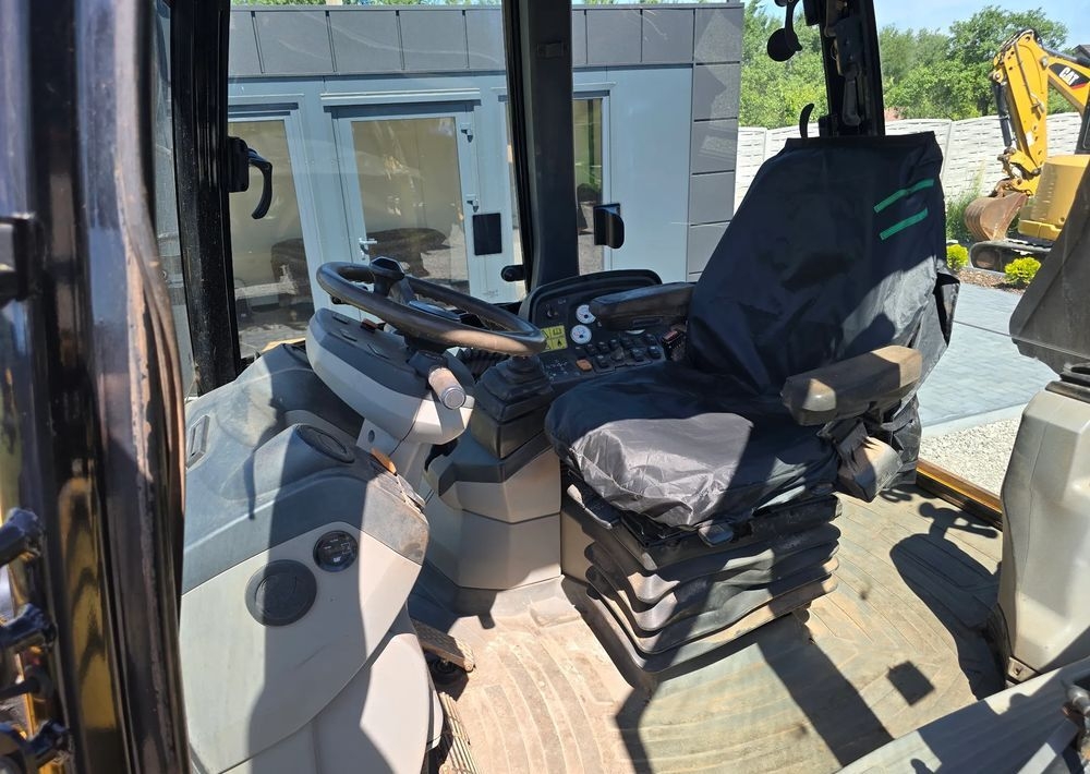 Backhoe loader Caterpillar- Photo 3