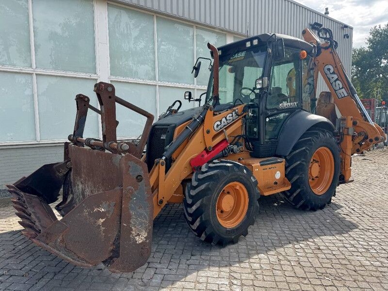 Baggerlader Case 580 ST- Photo 4