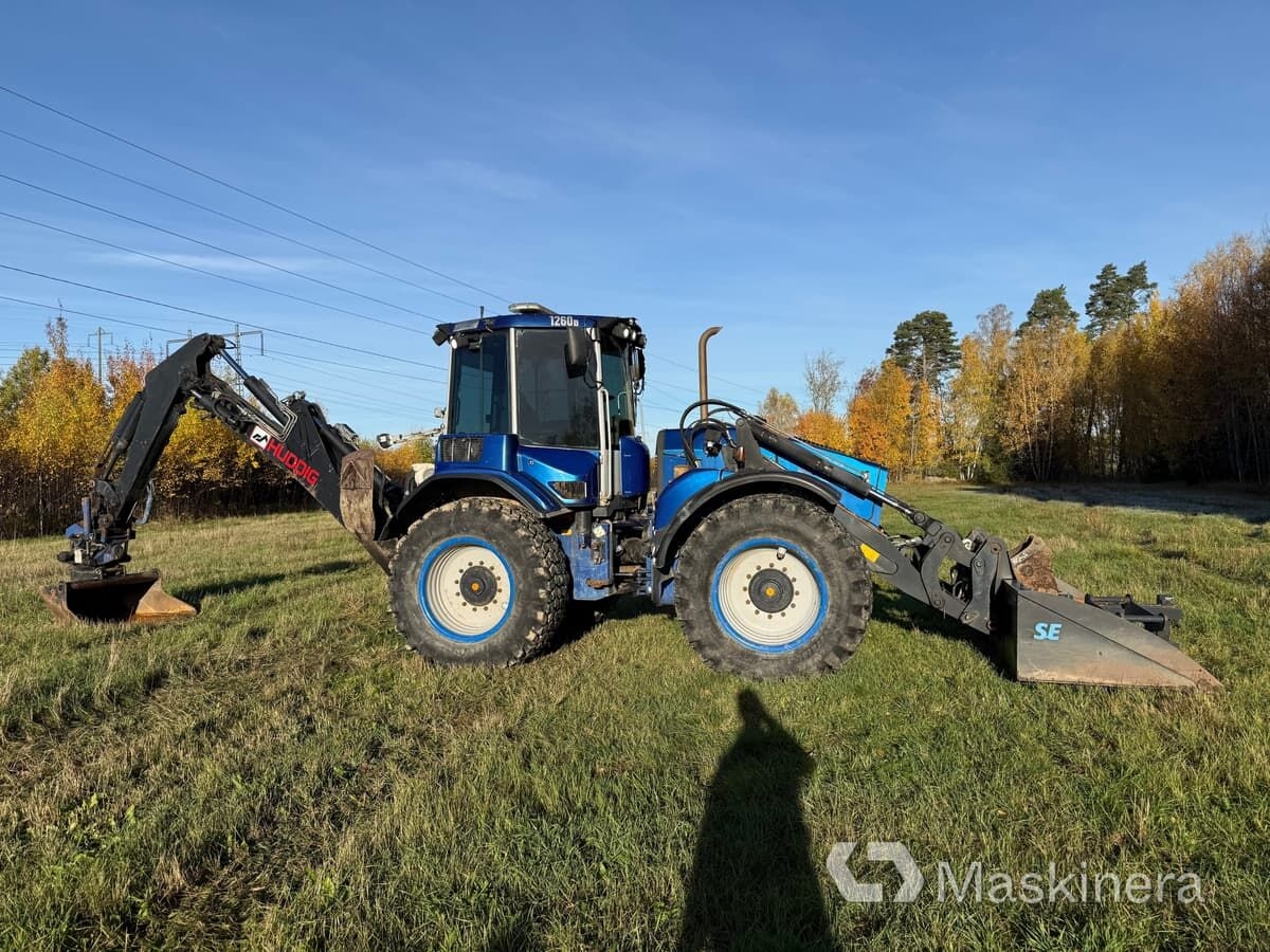 Baggerlader Traktorgrävare Huddig 1260B med redskap- Photo 2