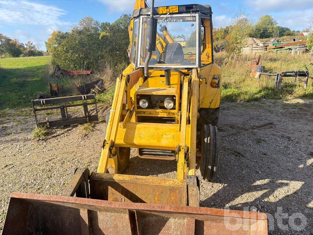 Backhoe loader Traktorgrävare MF 50B- Photo 2