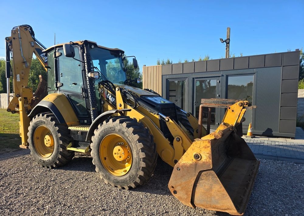 Backhoe loader Caterpillar- Photo 2