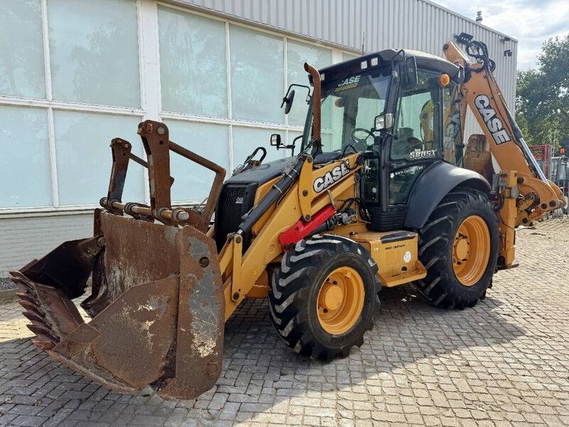 Baggerlader Case 580 ST- Photo 3